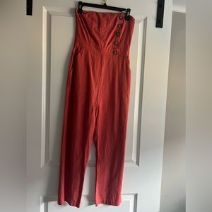 Orange summer jumpsuit.